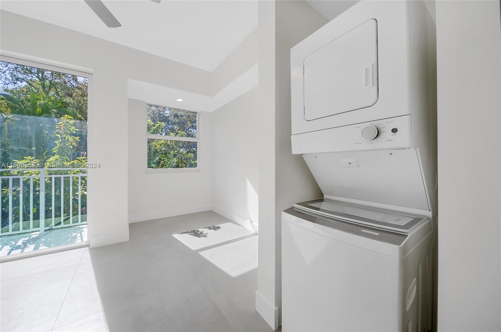 Civic Center Miami, FL 33125 - Photo 7 of 19 a utility room with dryer and washer