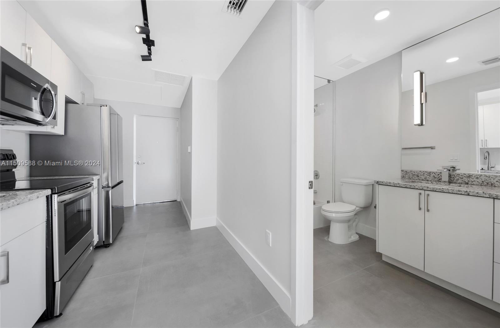 Civic Center Miami, FL 33125 - Photo 8 of 19 a bathroom with a sink toilet and shower