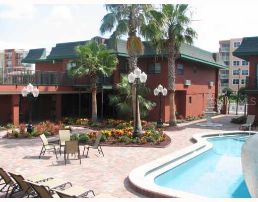 16333 Gulf Boulevard, Unit 209 Redington Beach, FL 33708 - Photo 1 of 1 a view of a house with backyard and sitting area