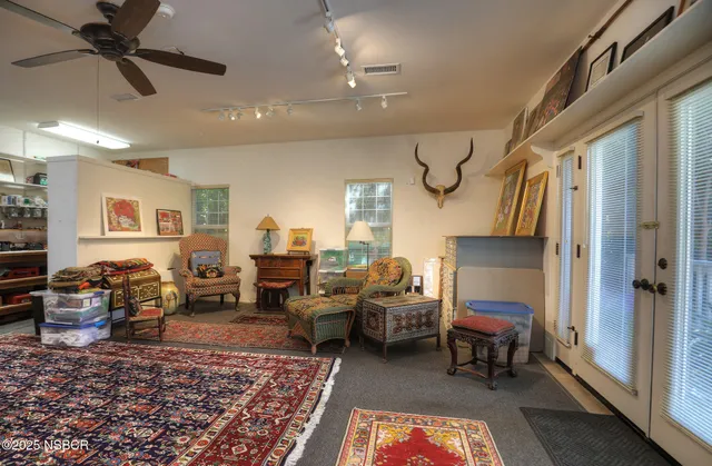 a view of a patio filled with furniture