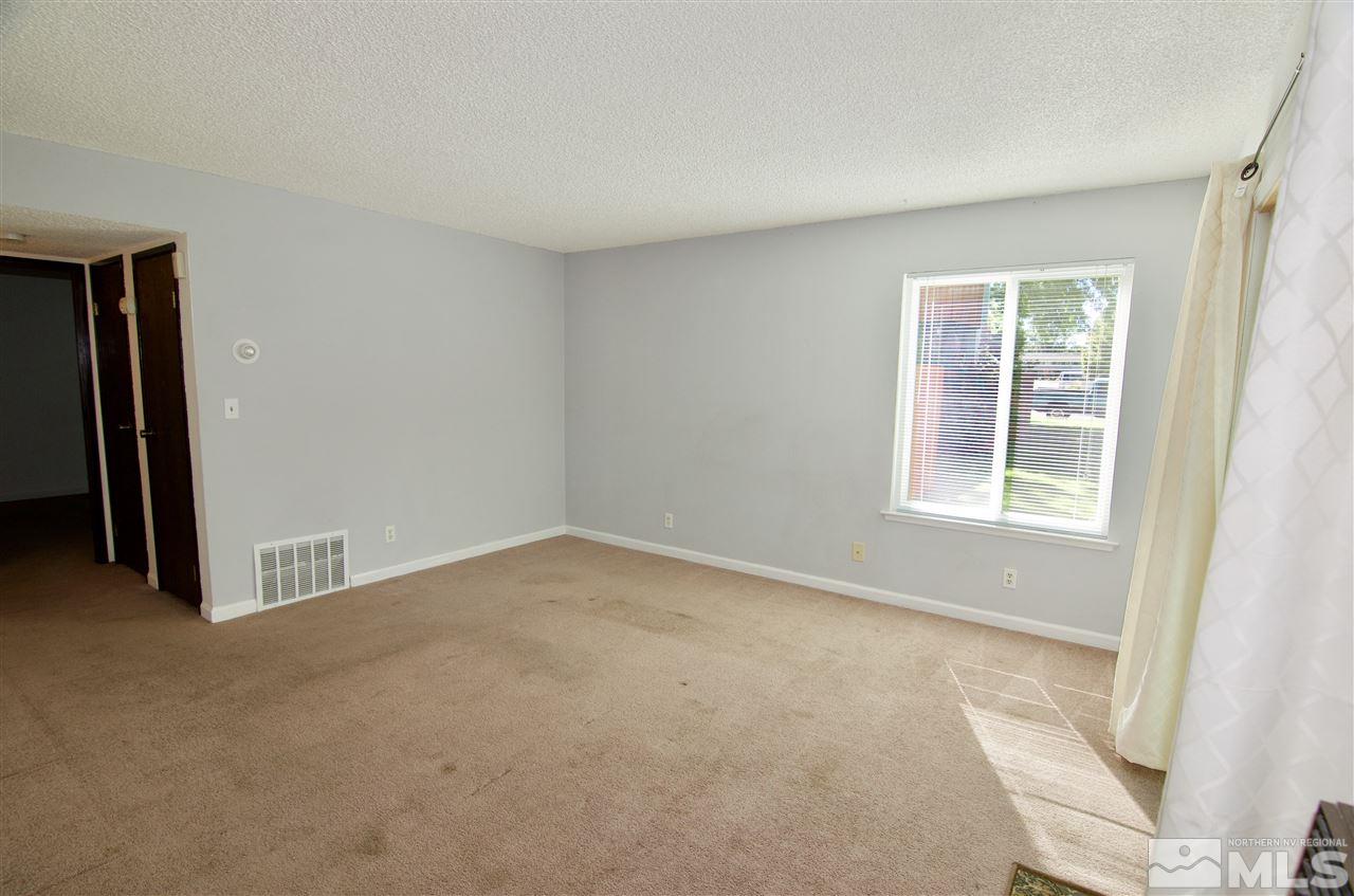 4606 Neil Road, Unit 167 Reno, NV 89502 - Photo 11 of 25 a view of an empty room with a window