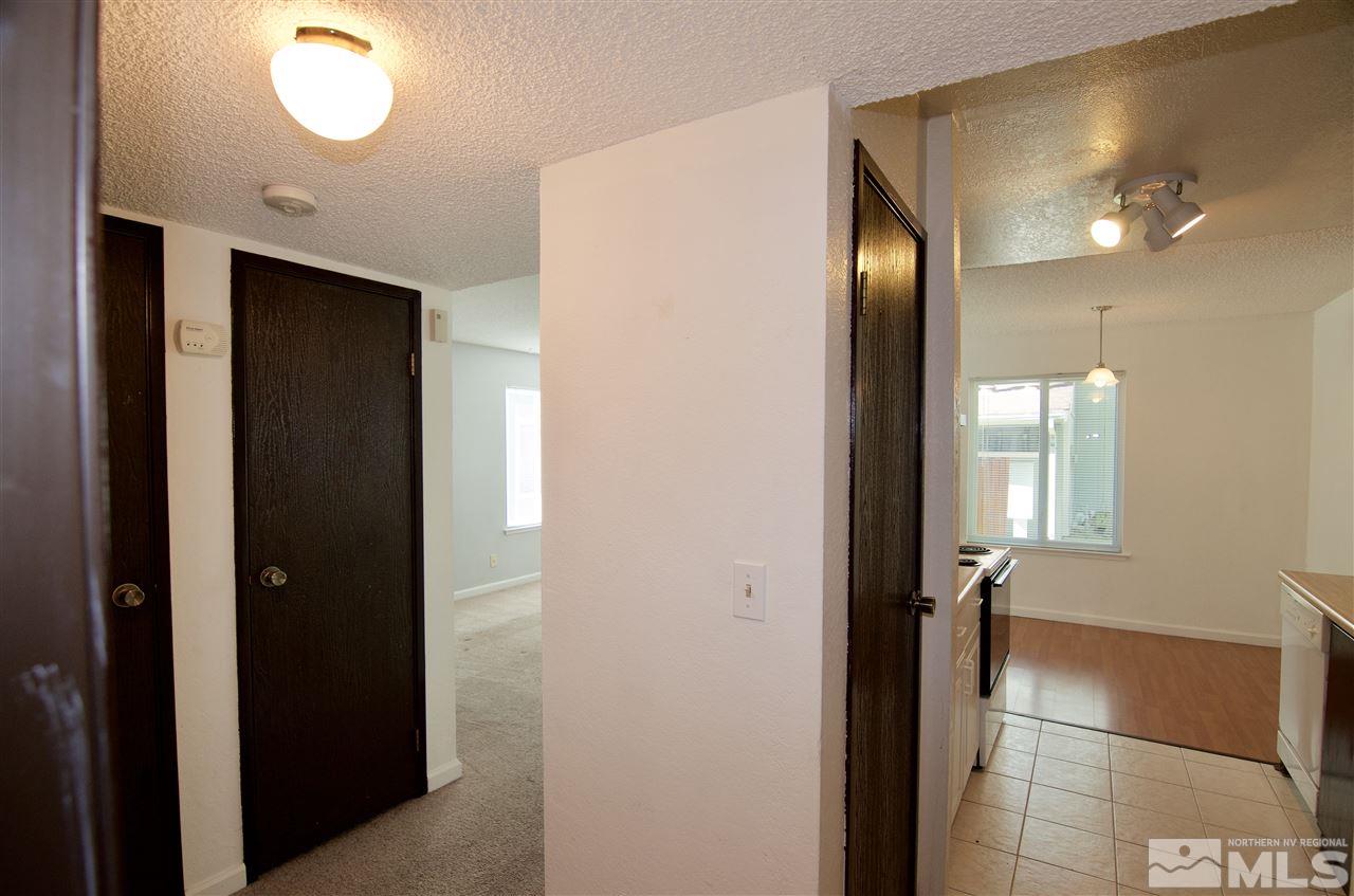 4606 Neil Road, Unit 167 Reno, NV 89502 - Photo 5 of 25 a view of a elevator and a mirror