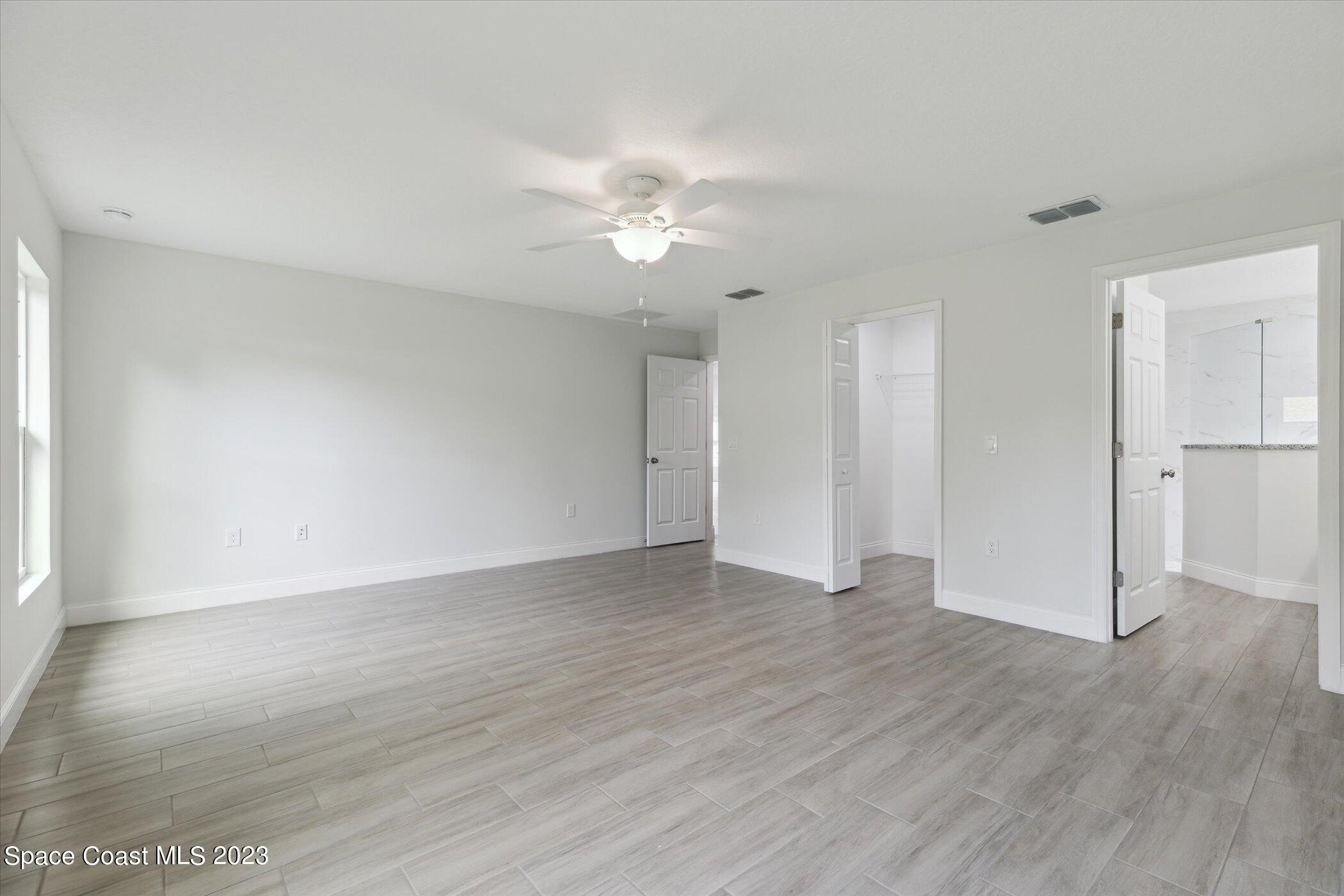 2406 Anchor Road Southeast Palm Bay, FL 32909 - Photo 22 of 37 Primary Bedroom