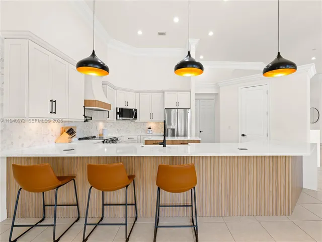 a view of a dining room with furniture and window