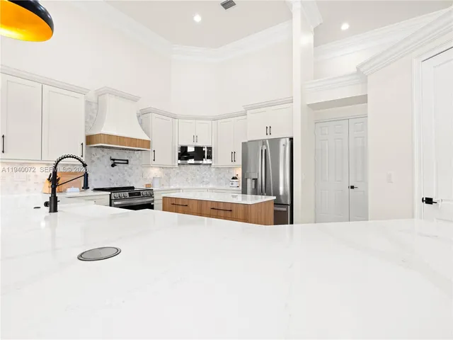 a view of a dining room with furniture