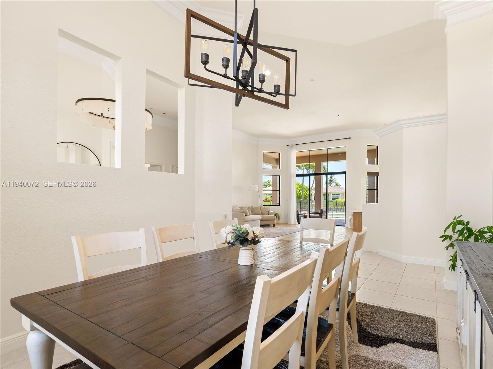 15016 Southwest 35th Street Davie, FL 33331 - Photo 17 of 50 a view of a dining room with furniture