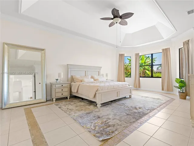 a spacious bathroom with a bathtub and a bathtub