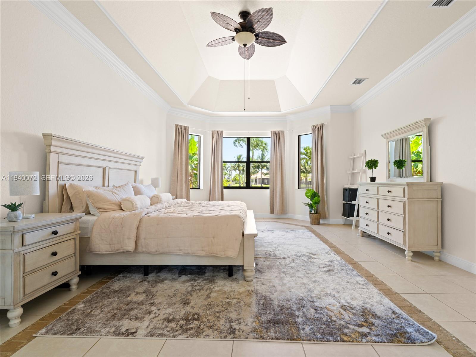 15016 Southwest 35th Street Davie, FL 33331 - Photo 19 of 50 a living room with furniture and large windows