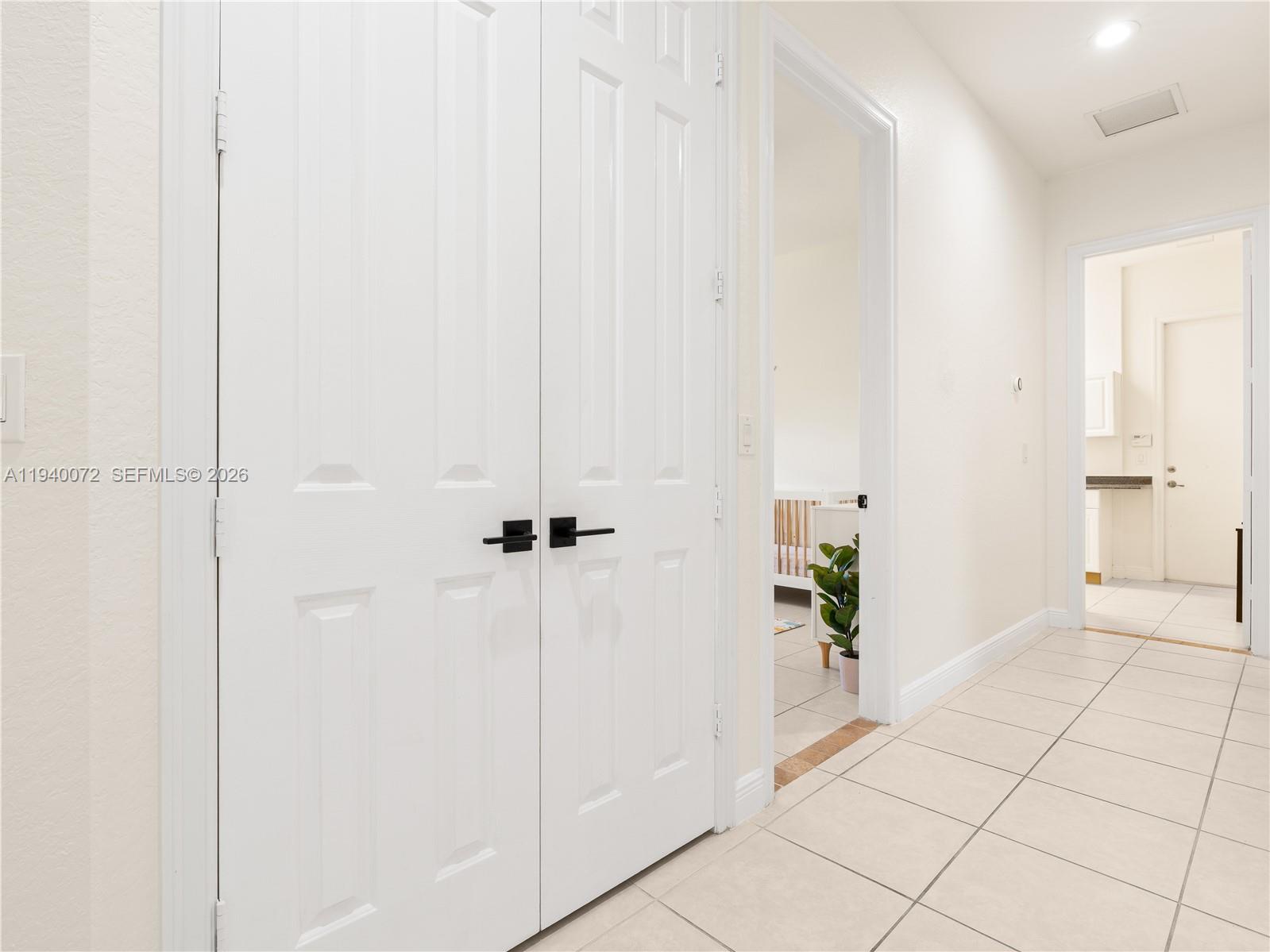 15016 Southwest 35th Street Davie, FL 33331 - Photo 34 of 50 a view of an entryway with wooden floor