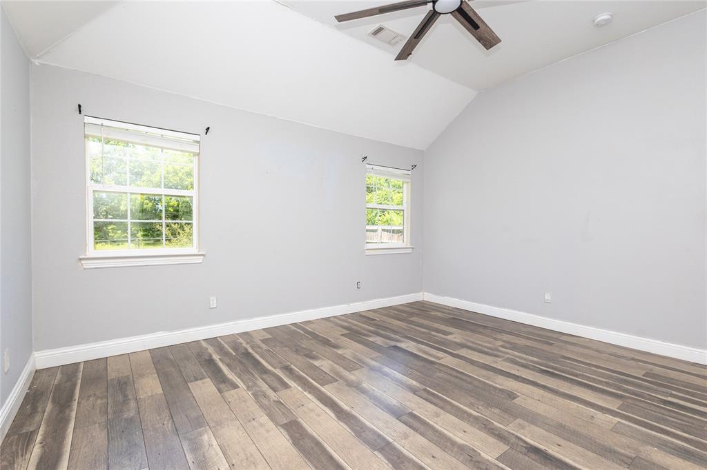 512 Milton Road Josephine, TX 75173 - Photo 17 of 31 wooden floor in an empty room with a window