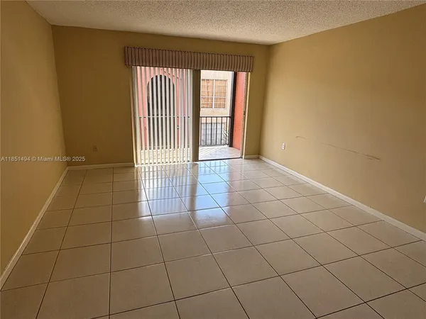 a view of a livingroom with a window