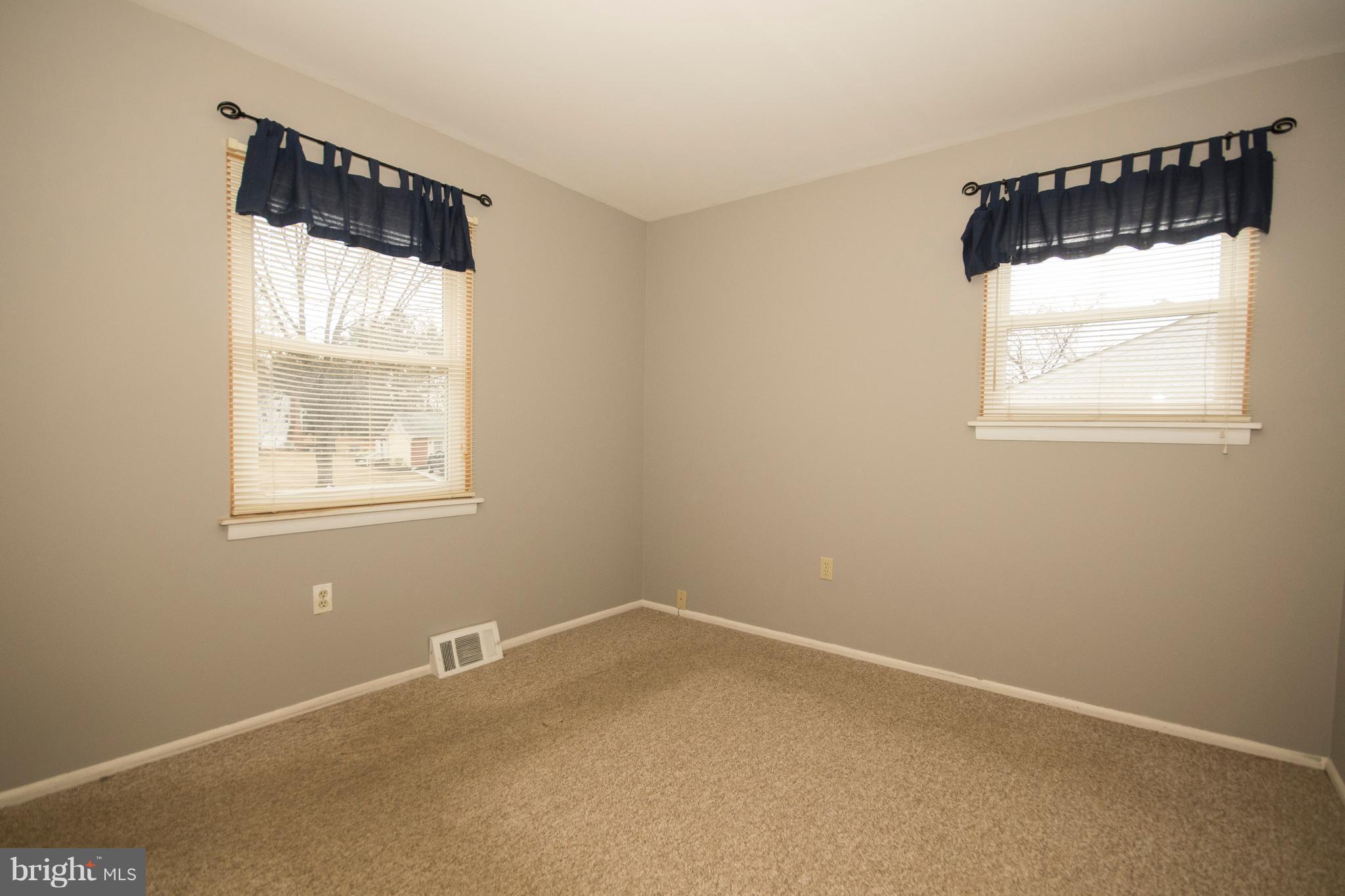 228 Embleton Road Owings Mills, MD 21117 - Photo 15 of 24 an empty room with a window