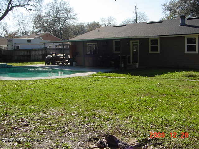 12693 Beaubien Road Jacksonville, FL 32258 - Photo 5 of 6 a view of a house with backyard porch and sitting area