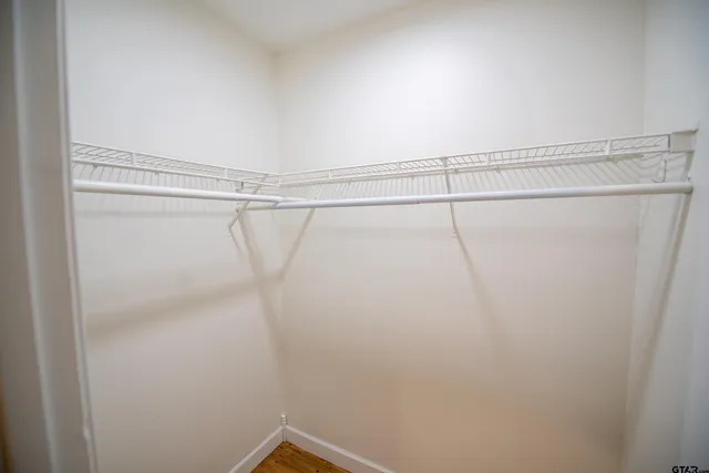 a view of a room with racks on the wall