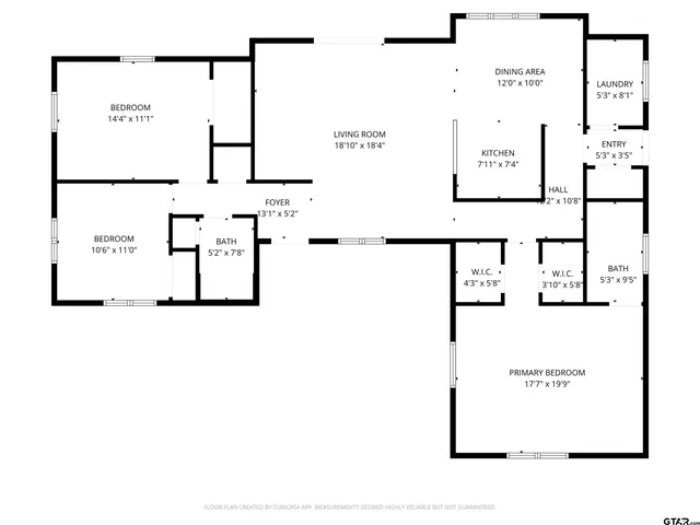 a picture of a wall with a white building