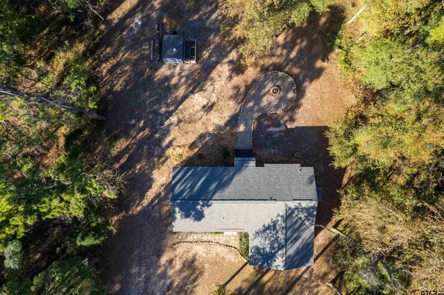 a view of house with yard