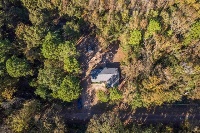 a backyard of a house with a garden