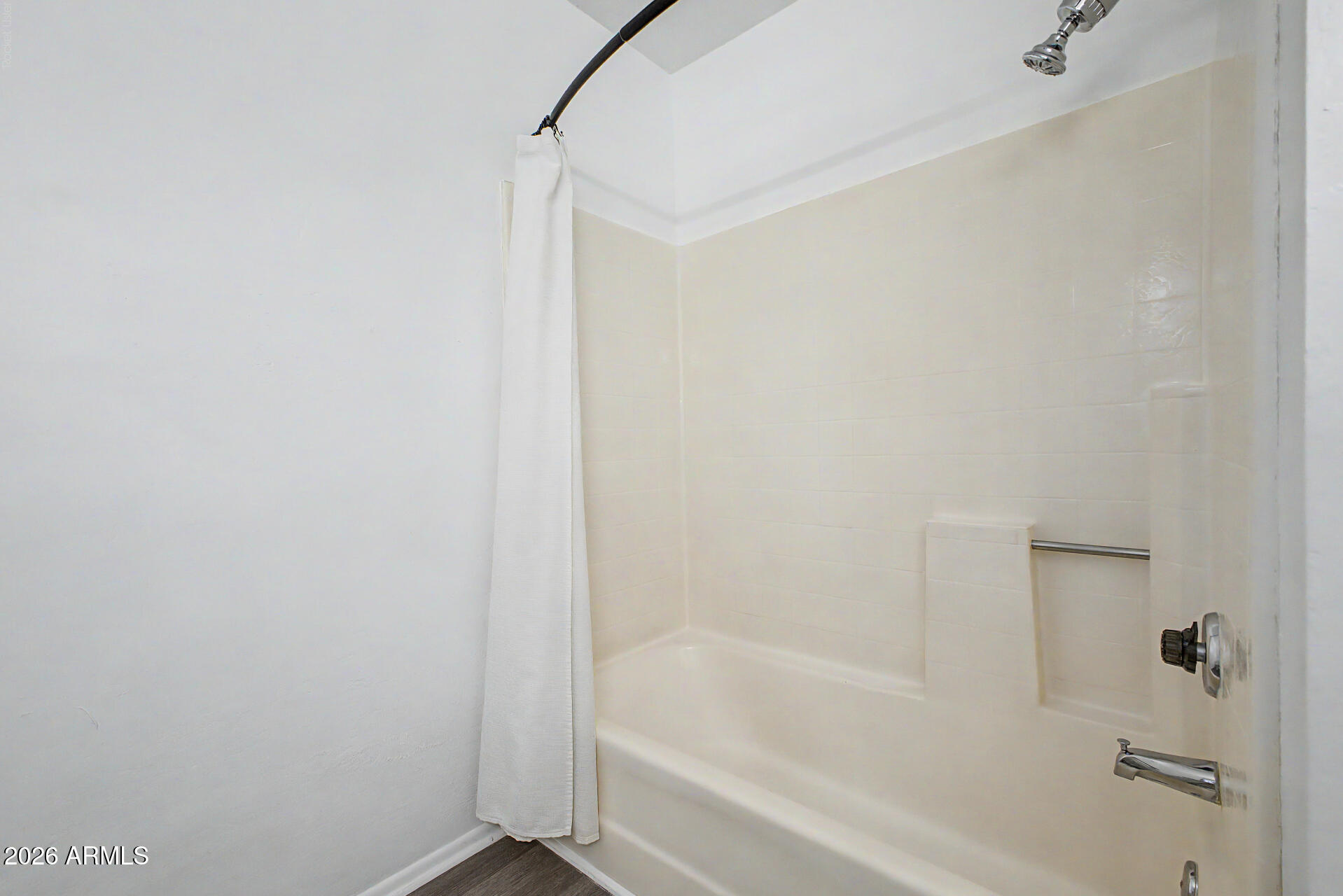 2455 East Broadway Road, Unit 103 Mesa, AZ 85204 - Photo 13 of 22 a bathroom with a bathtub