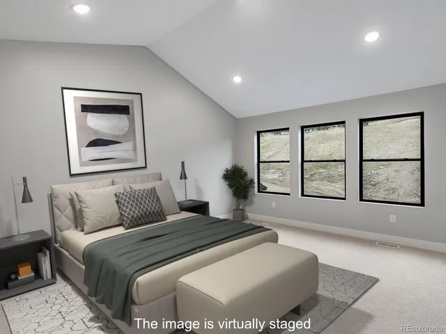 an empty room with windows and cabinet