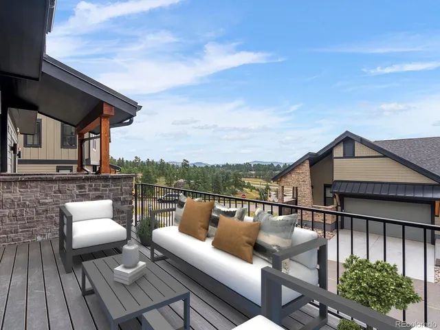 a balcony view with a glass door