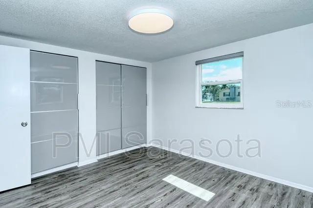 a view of a livingroom with wooden floor
