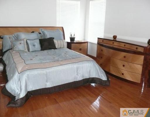 312 Hawthorne Road North Brunswick, NJ 08902 - Photo 6 of 10 a bedroom with a bed and window