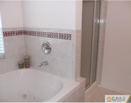 312 Hawthorne Road North Brunswick, NJ 08902 - Photo 8 of 10 a bathroom with a bathtub