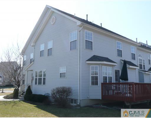 312 Hawthorne Road North Brunswick, NJ 08902 - Photo 10 of 10 a front view of a house with yard