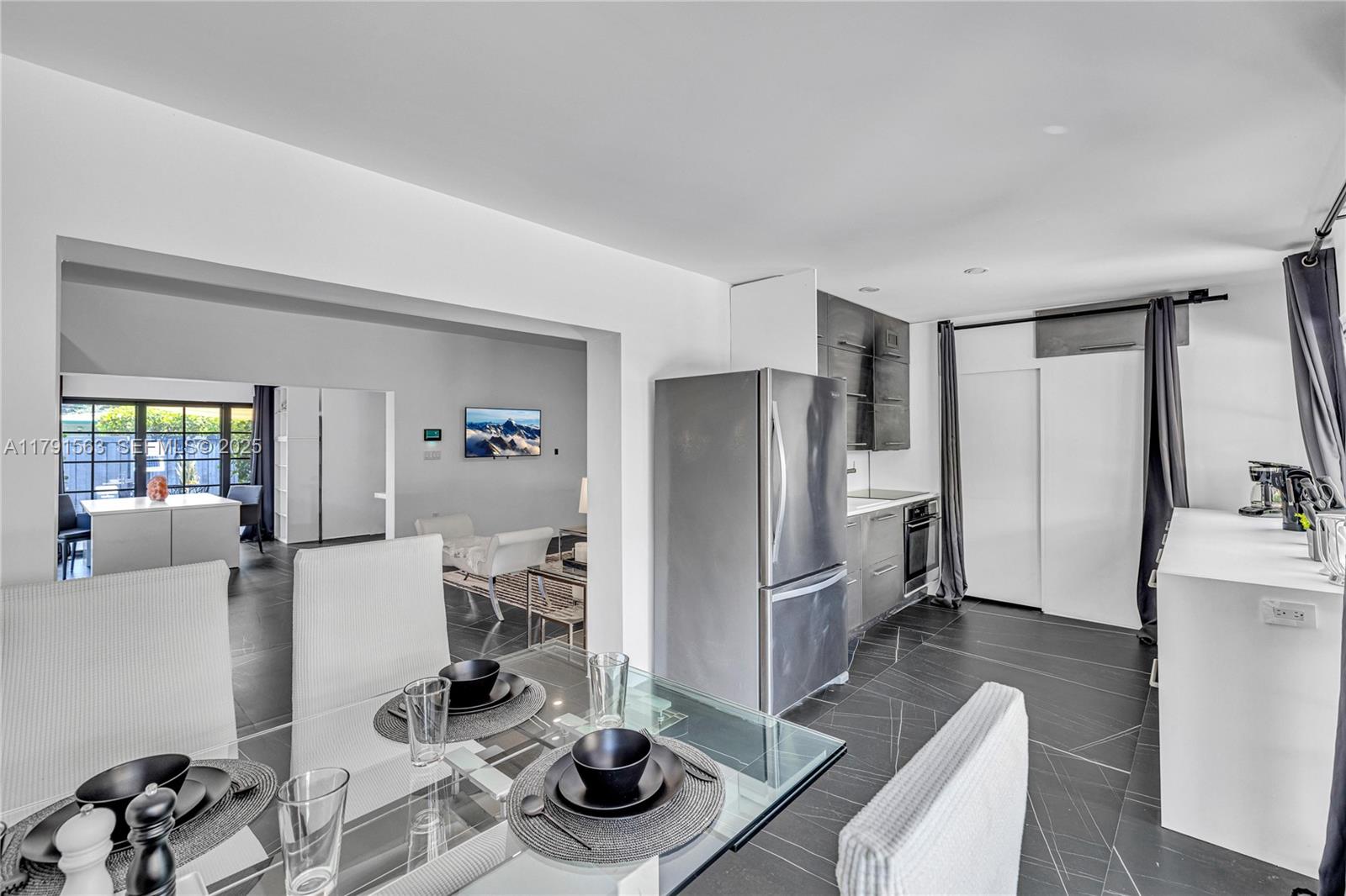 560 Northwest 116th Terrace Miami, FL 33168 - Photo 15 of 50 a kitchen with stainless steel appliances granite countertop a refrigerator and a sink