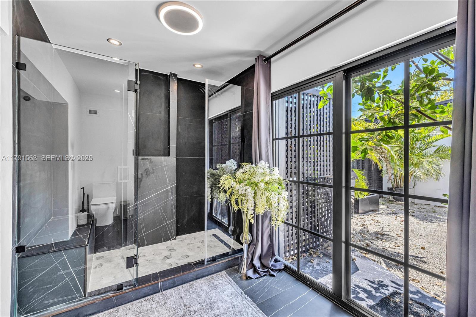 560 Northwest 116th Terrace Miami, FL 33168 - Photo 23 of 50 a very nice looking room with a large window