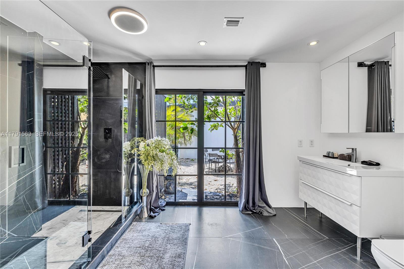 560 Northwest 116th Terrace Miami, FL 33168 - Photo 27 of 50 a view of a hallway with workspace
