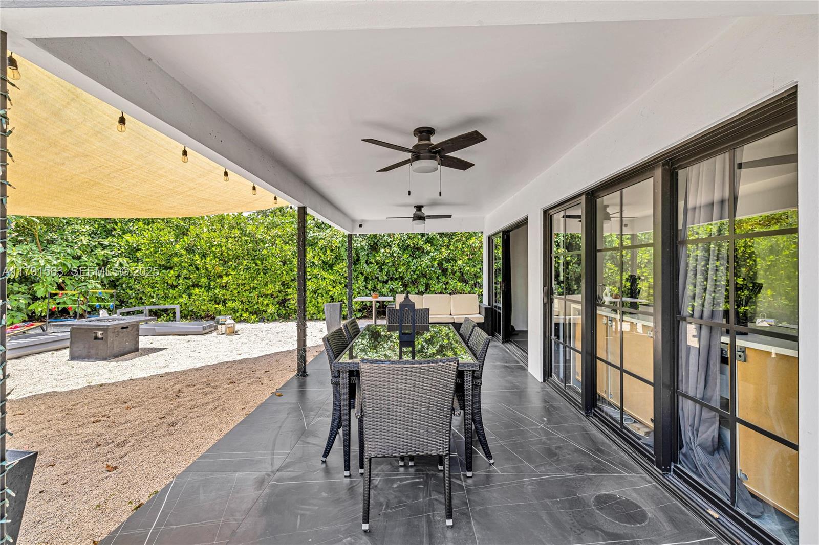 560 Northwest 116th Terrace Miami, FL 33168 - Photo 30 of 50 a dining room with furniture window and outside view