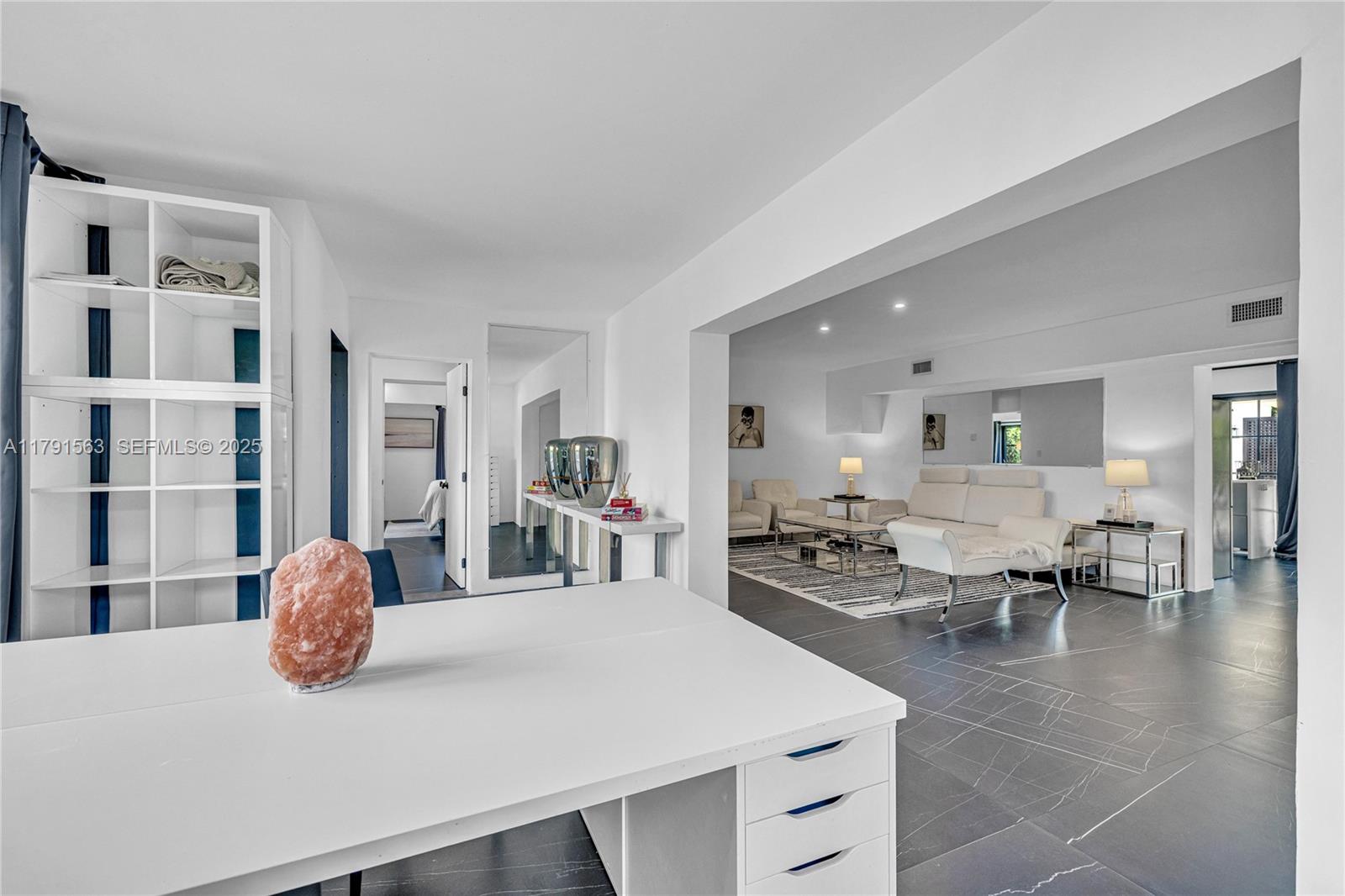 560 Northwest 116th Terrace Miami, FL 33168 - Photo 5 of 50 a living room with furniture a table and chairs