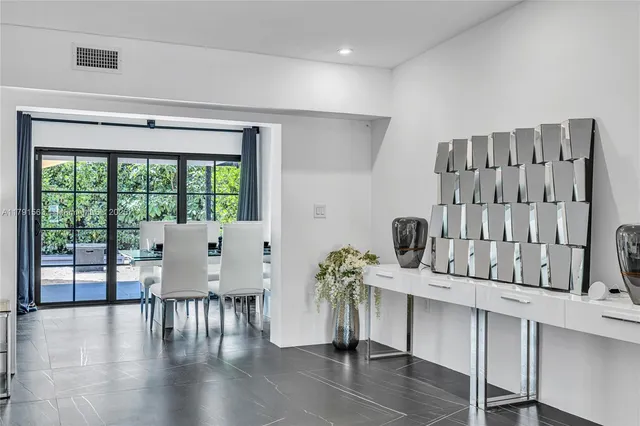 a workspace with furniture and window