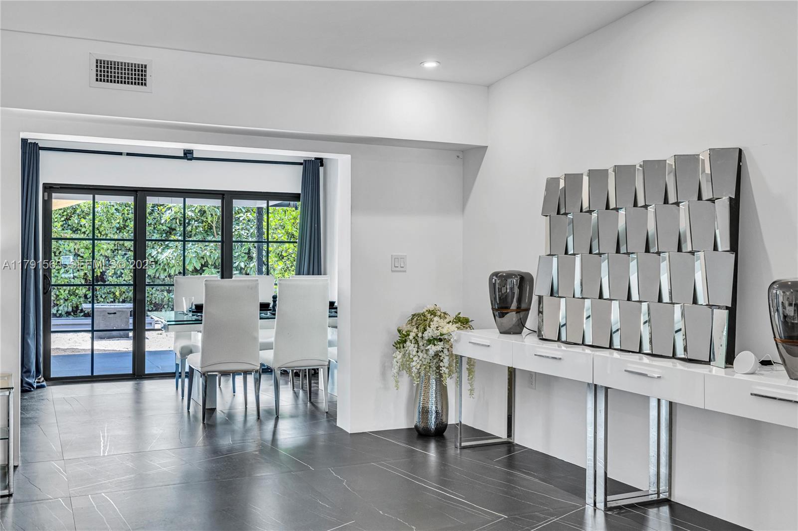 560 Northwest 116th Terrace Miami, FL 33168 - Photo 9 of 50 a workspace with furniture and window