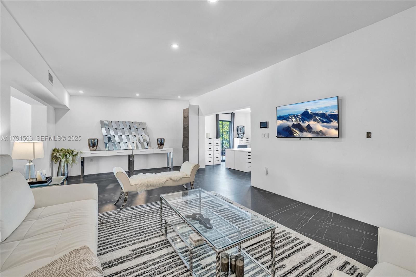 560 Northwest 116th Terrace Miami, FL 33168 - Photo 10 of 50 a living room with furniture and wooden floor