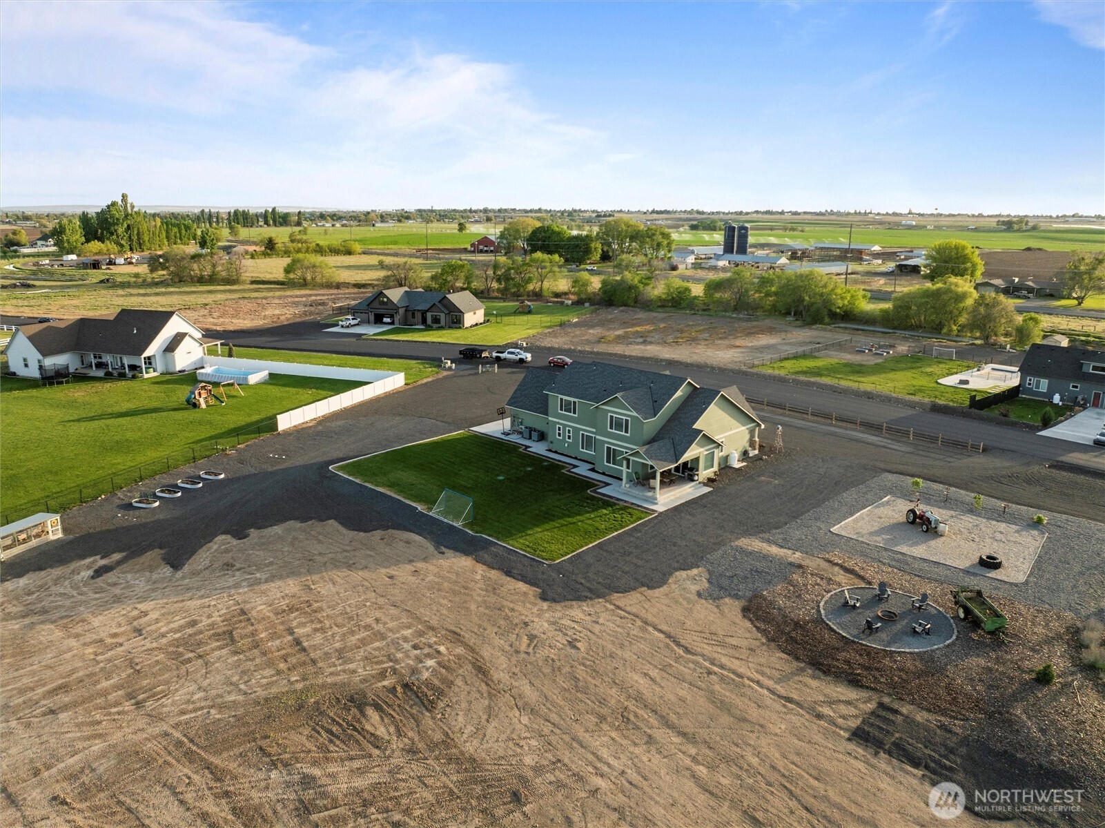 5889 Ne Road Moses Lake, WA 98837 - Photo 11 of 39 an aerial view of a house with a yard