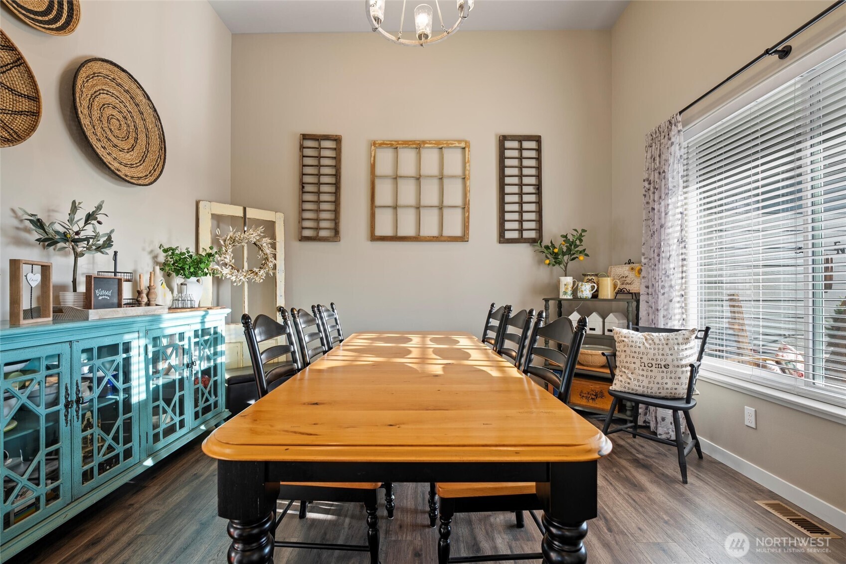 5889 Ne Road Moses Lake, WA 98837 - Photo 19 of 39 a view of a dining room with furniture window and wooden floor