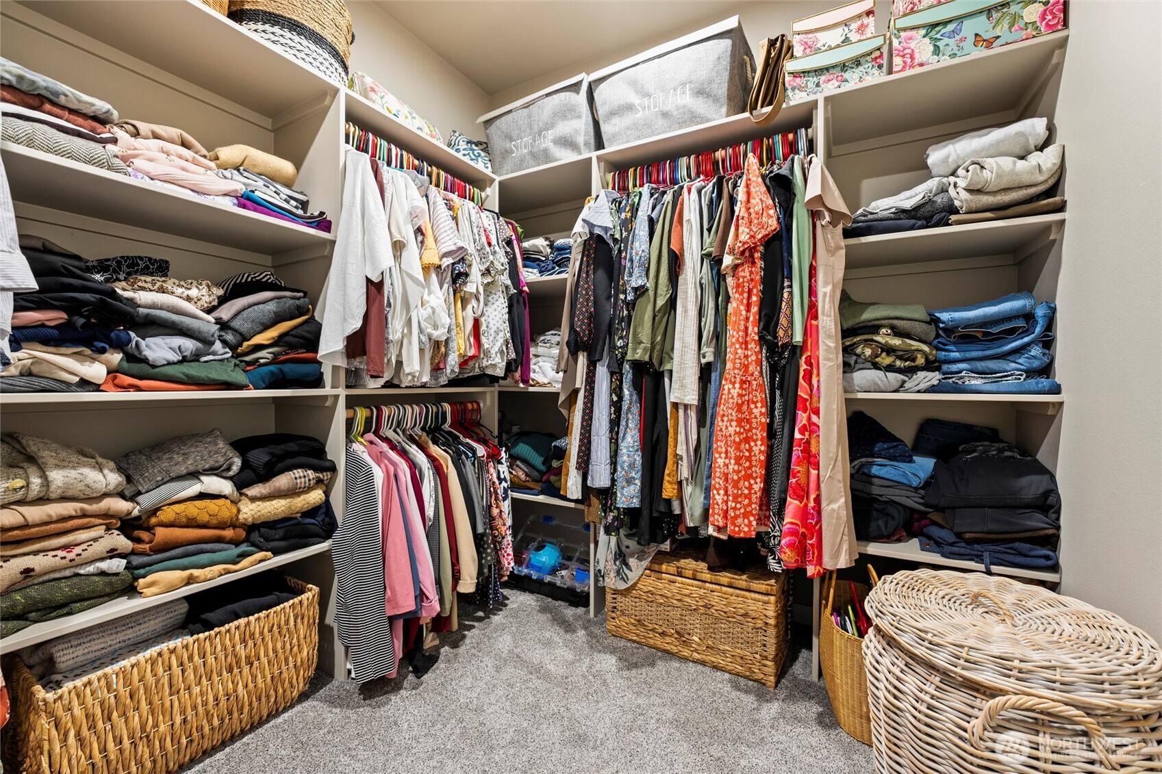 5889 Ne Road Moses Lake, WA 98837 - Photo 28 of 39 a view of walk in closet with clothes and shoes
