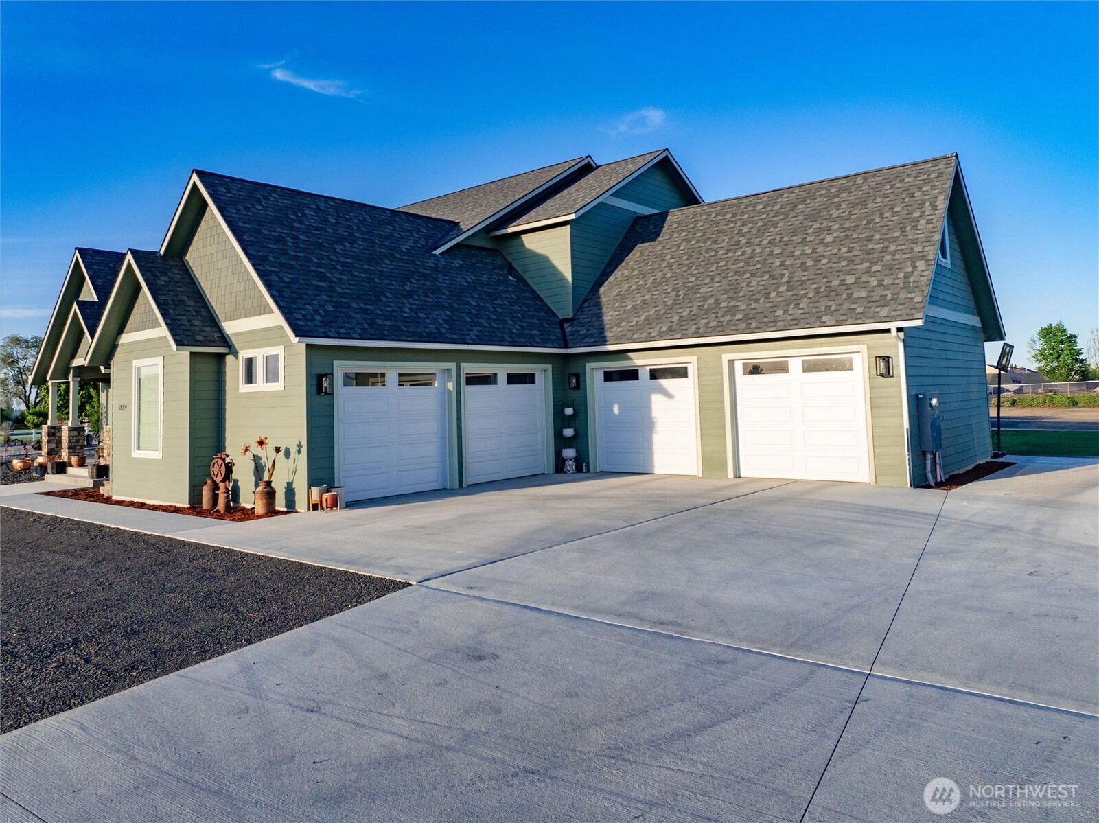 5889 Ne Road Moses Lake, WA 98837 - Photo 3 of 39 a view of a house with a street