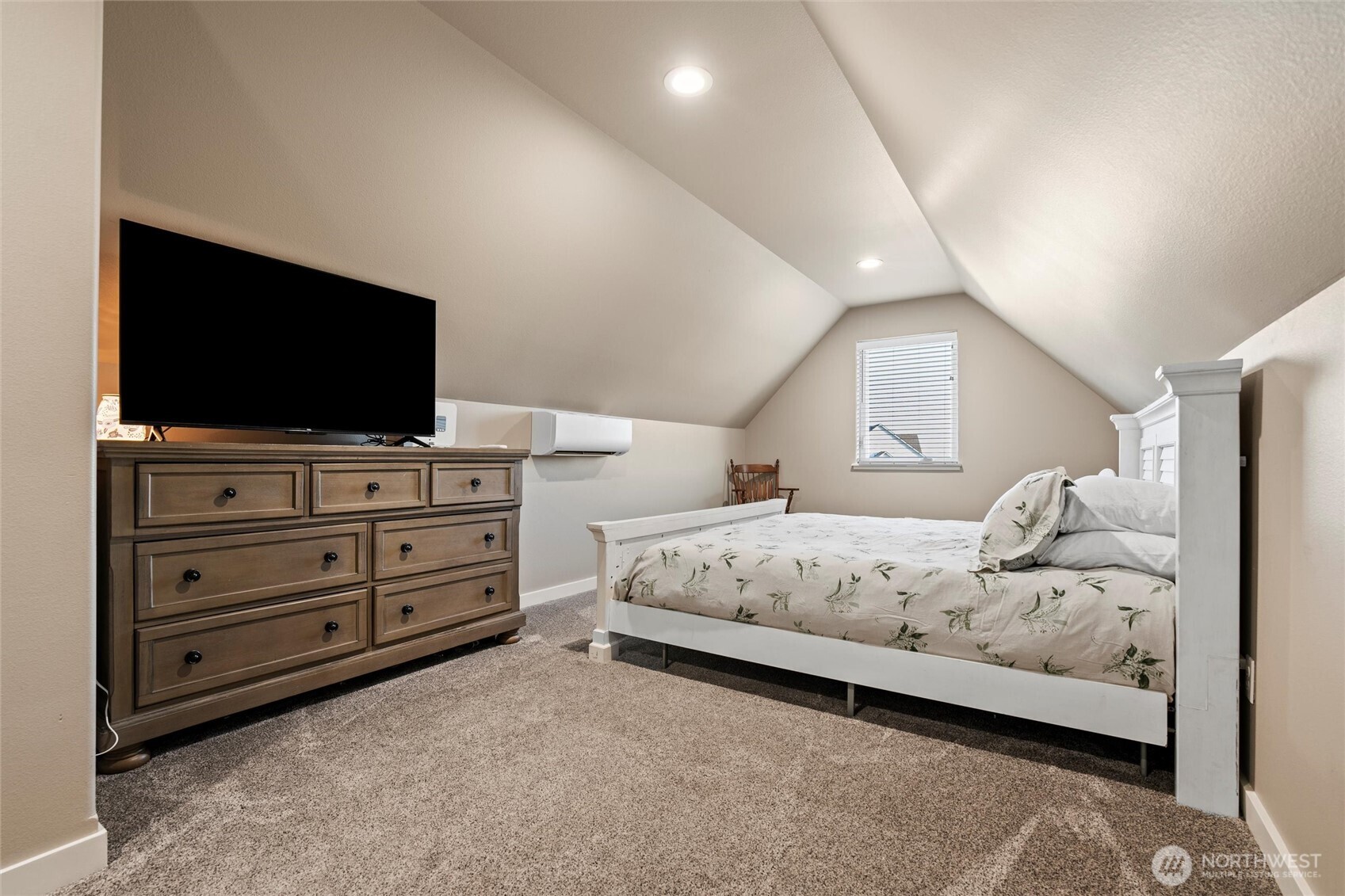 5889 Ne Road Moses Lake, WA 98837 - Photo 33 of 39 a bedroom with a bed and flat screen tv
