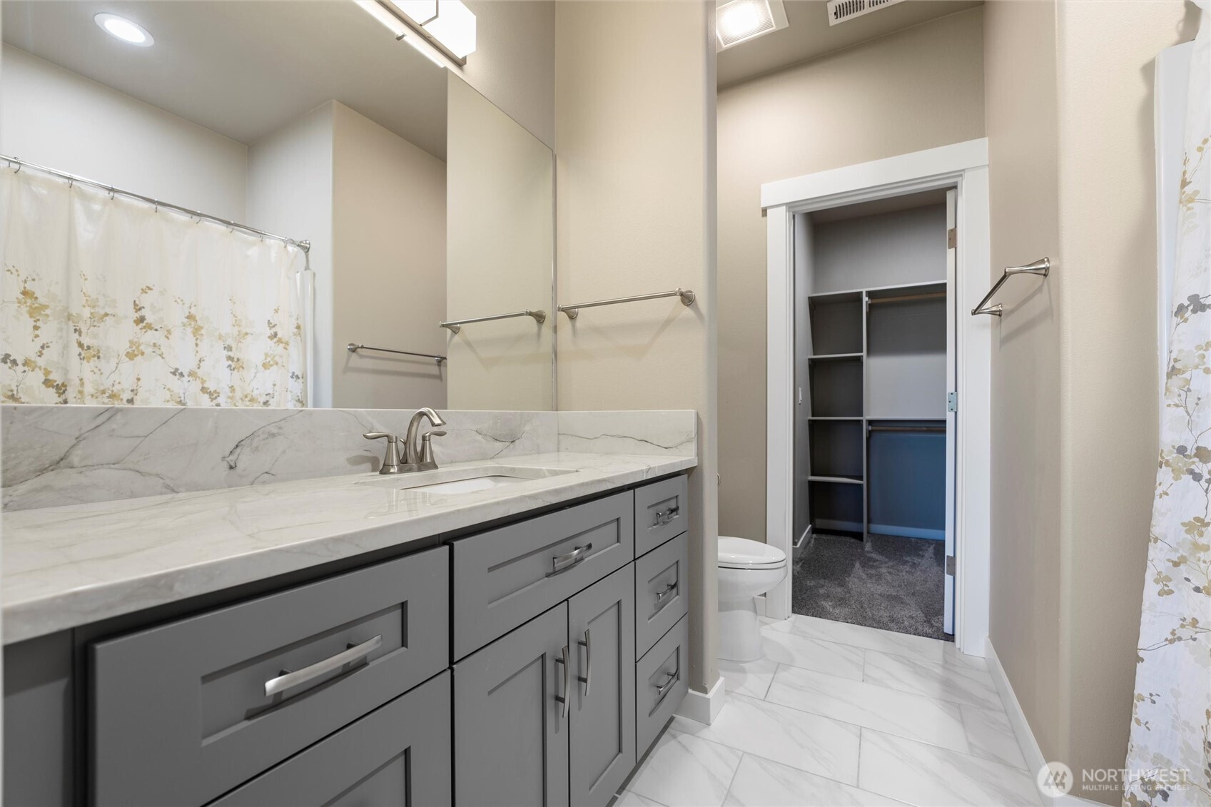 5889 Ne Road Moses Lake, WA 98837 - Photo 35 of 39 a bathroom with a sink and a mirror
