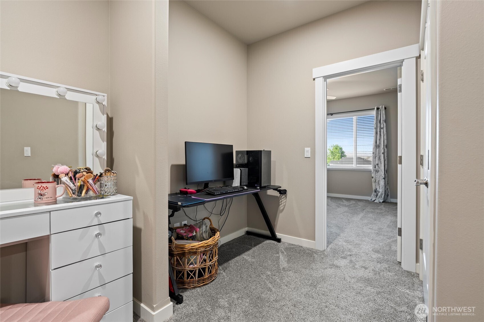 5889 Ne Road Moses Lake, WA 98837 - Photo 37 of 39 a view of a workspace with a cabinet and flat screen tv