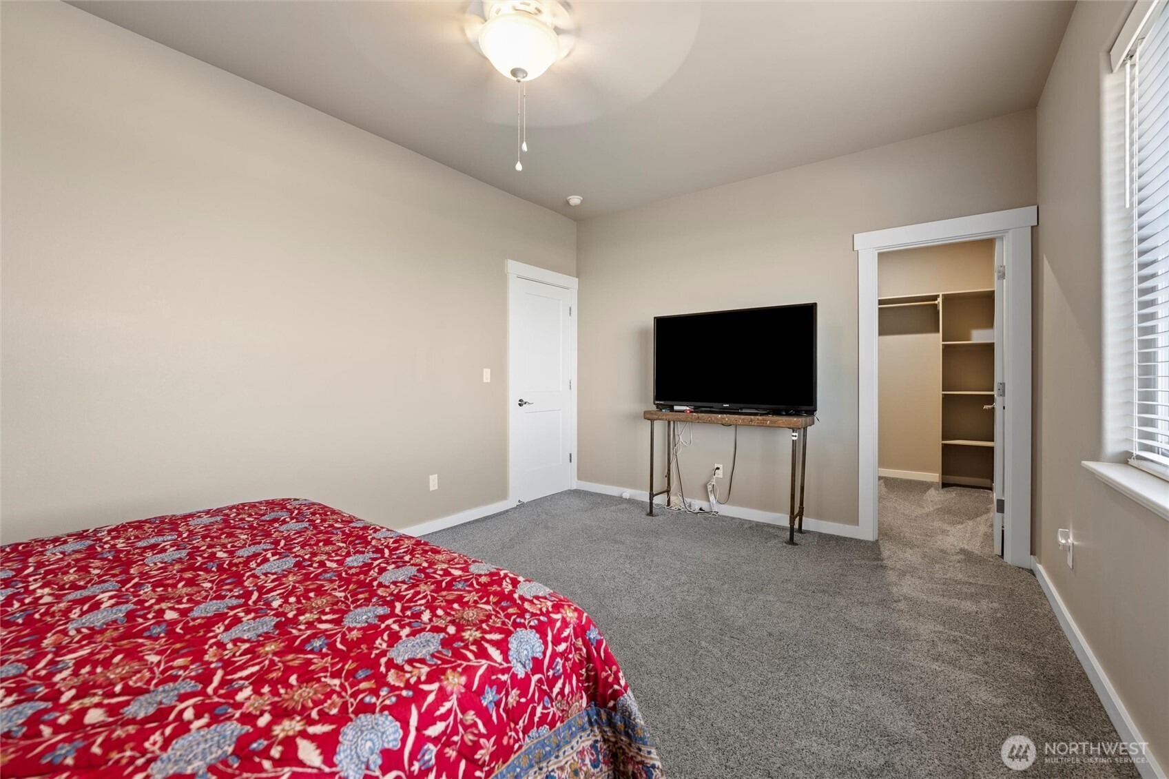 5889 Ne Road Moses Lake, WA 98837 - Photo 38 of 39 a bedroom with a bed and a flat screen tv