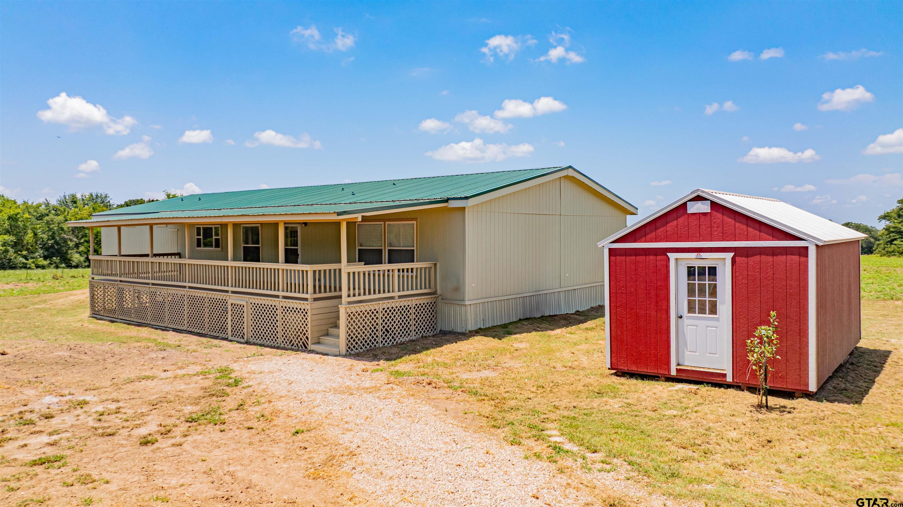 a view of front of house with garage