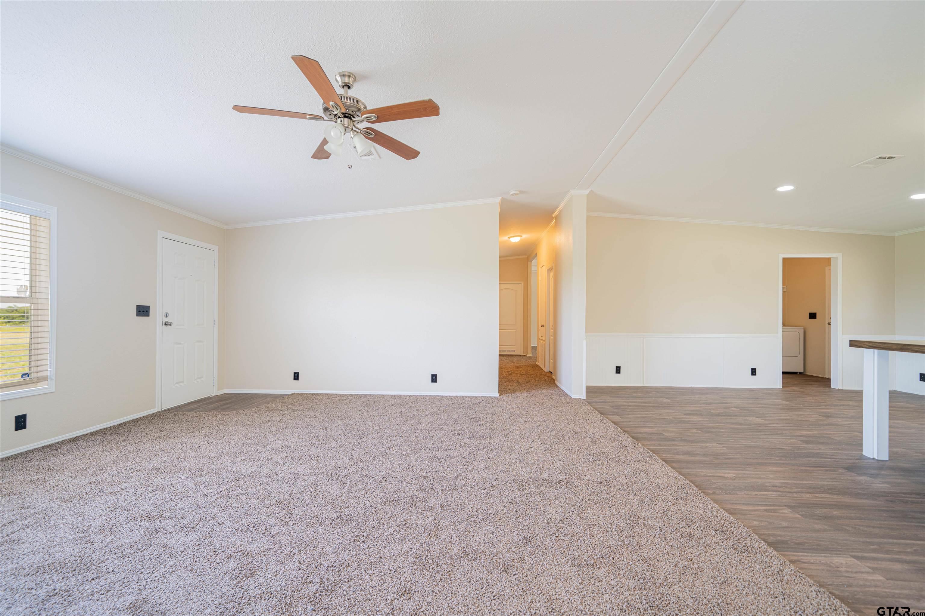 95 County Road 3565 Dike, TX 75437 - Photo 28 of 36 a view of a livingroom with a ceiling fan & window
