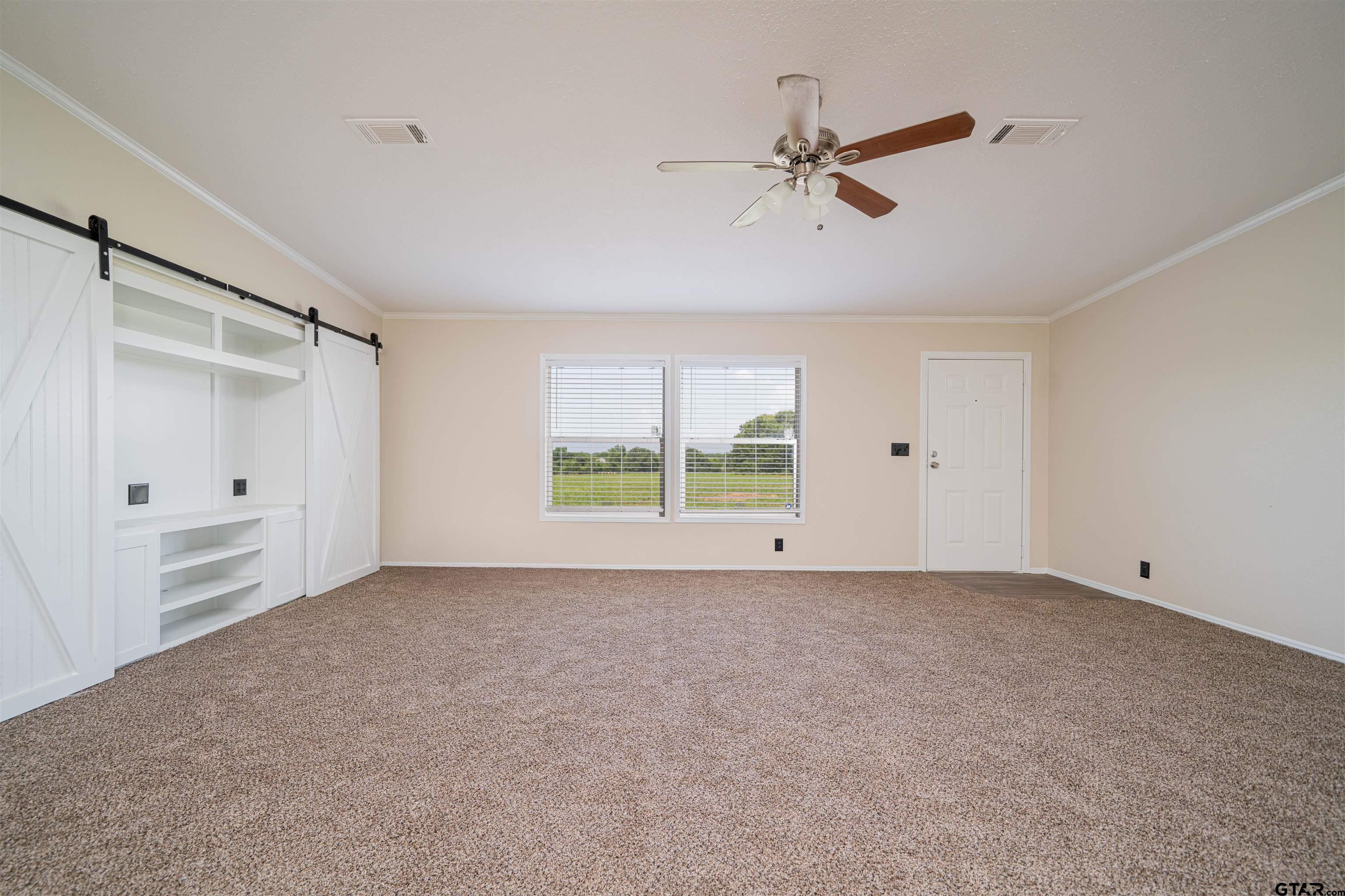 95 County Road 3565 Dike, TX 75437 - Photo 29 of 36 a view of an empty room with a window