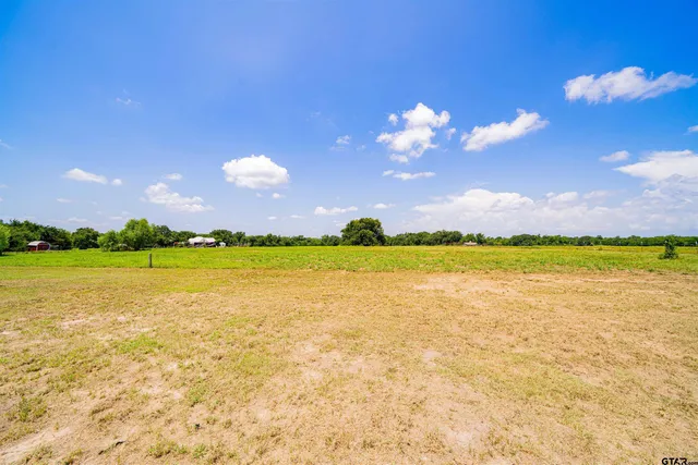 a view of an ocean and a mountain