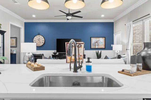 a bathroom with a double vanity sink and mirror