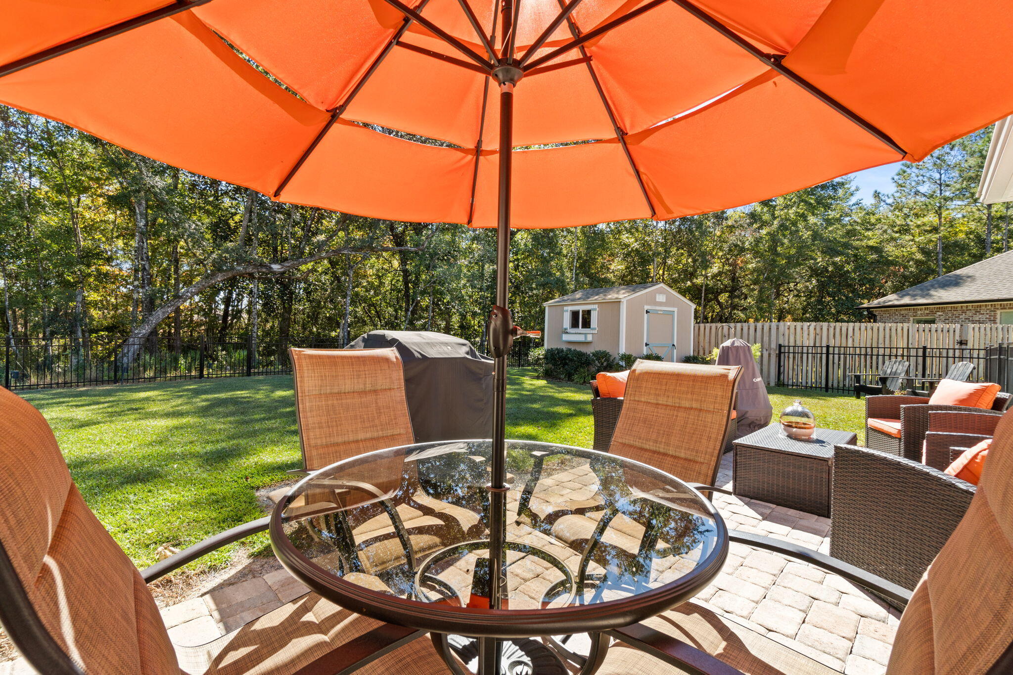 33 Cozy Cove Freeport, FL 32439 - Photo 2 of 87 a view of a patio with a table chairs and a backyard